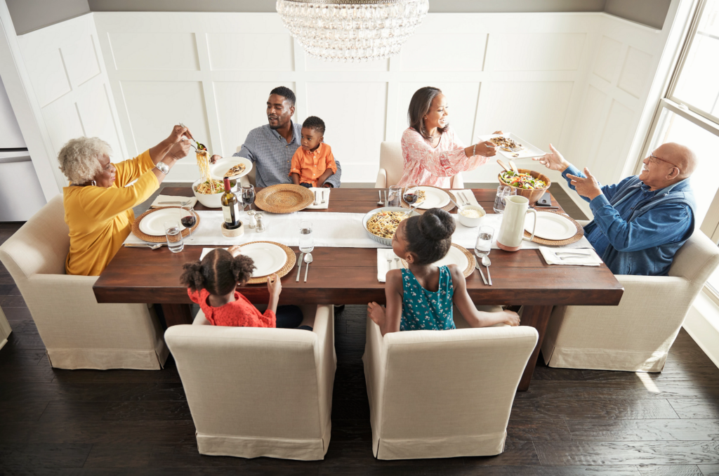 Happy family enjoying break fast | Bowling Carpet